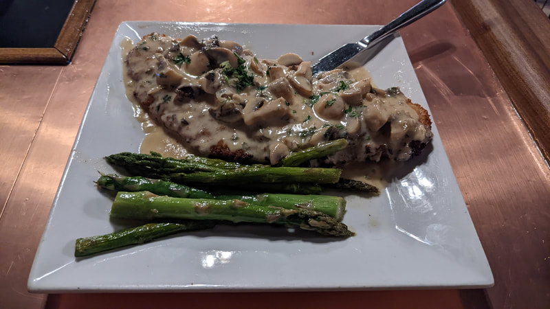 Breaded snapper with a truffle cream sauce!
